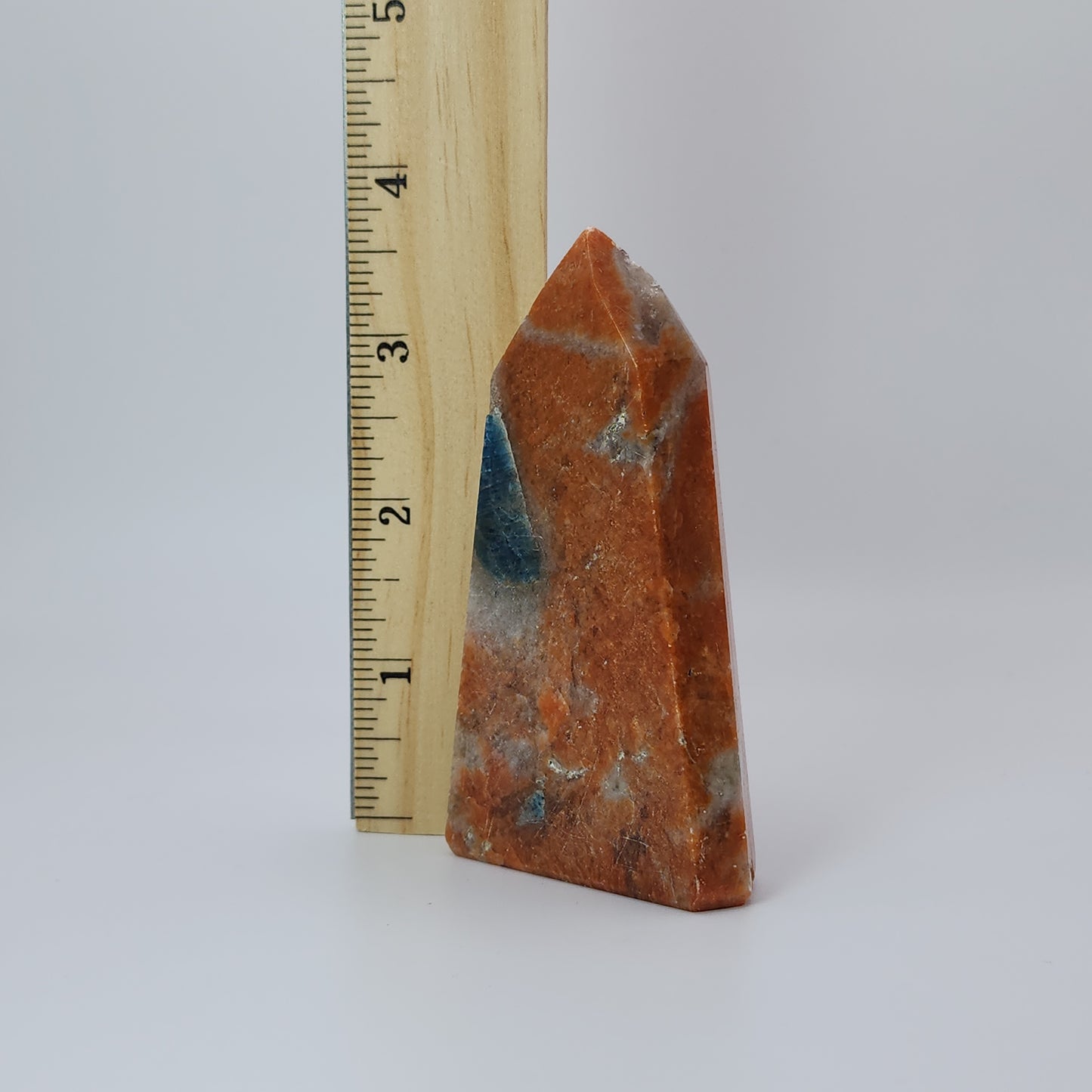 Blue Apatite in Orange Calcite Tower