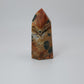Blue Apatite in Orange Calcite Tower
